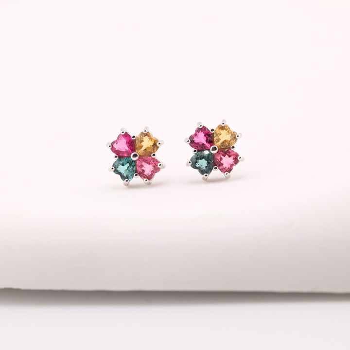 Pair of multicolored Tourmaline gemstone earrings on a white background